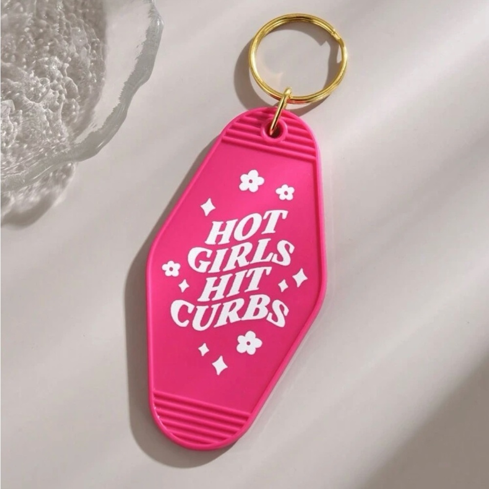 Vibrant Pink Keychain with Playful Quote